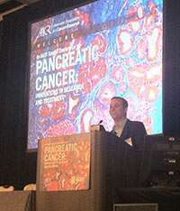 Pancreatic cancer survivor Robb Lamont speaks at the opening plenary session of the meeting.