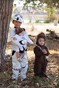 May the force be with you! Ian, Isaac and Emlee Maglinte channel favorite “Star Wars” characters on Halloween 2014.