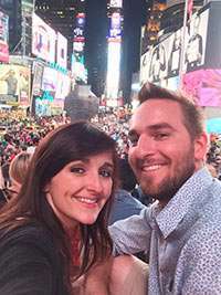 Allison and Todd snapping a selfie in Times Square in New York City.