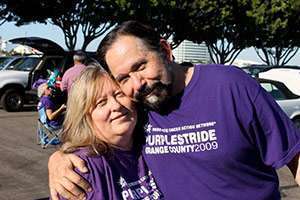 Roberta Luna, a 14-year pancreatic cancer survivor, with her husband, Vic, at PurpleStride Orange County.