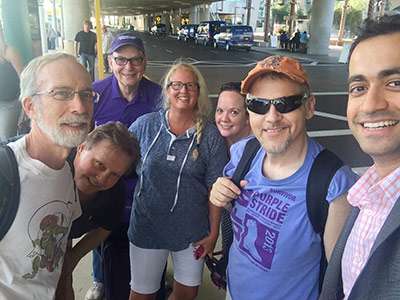 Drs. Beg (right) and Boothman (second from left) with the Dallas-Fort Worth cohort of volunteers arriving for the Annual Scientific Meeting and Community Engagement Leadership Training events.