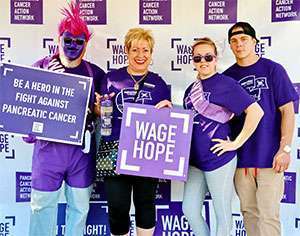 Pam (center) with supporters at PurpleStride Los Angeles