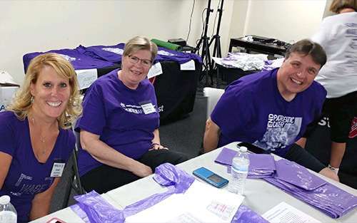 Jill, Diane and Andrew at packet pickup.