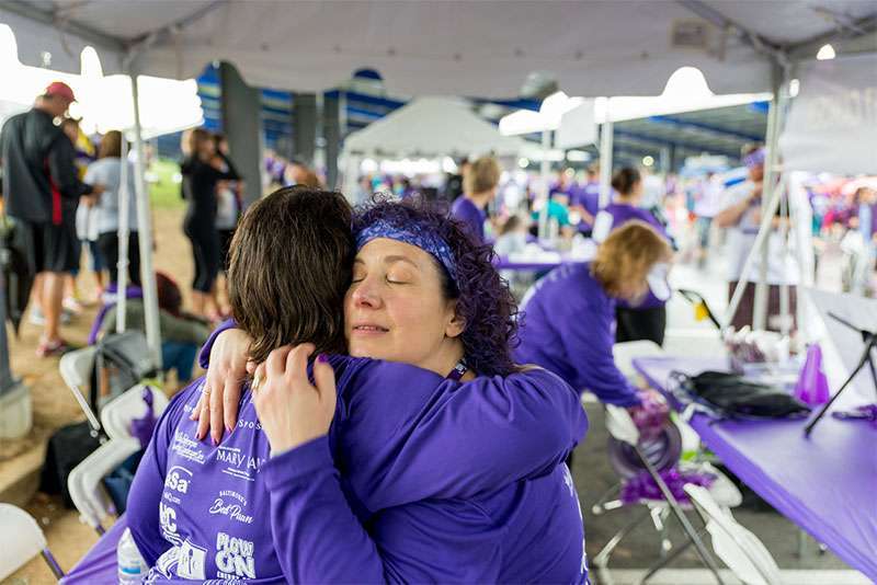 One of several heartfelt moments captured by photographer Alex Harris at PurpleStride Maryland.