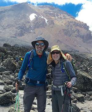 Ken Brown (right) poses with Dr. Malcolm Bilimoria (left) on Mt. Kilimanjaro