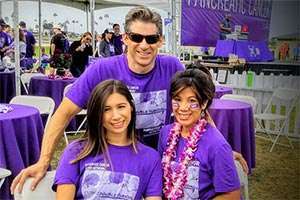 21-year pancreatic cancer survivor with her husband and daughter at 5K walk in San Diego. 