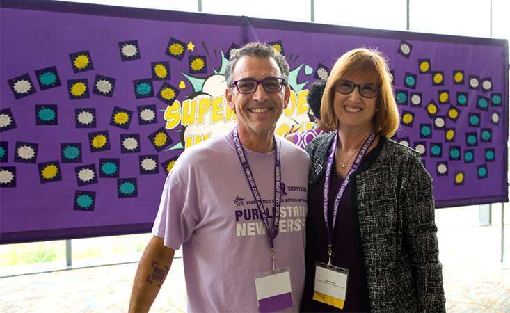 New PanCAN Chief Officer smiles with a pancreatic cancer survivor at annual conference.