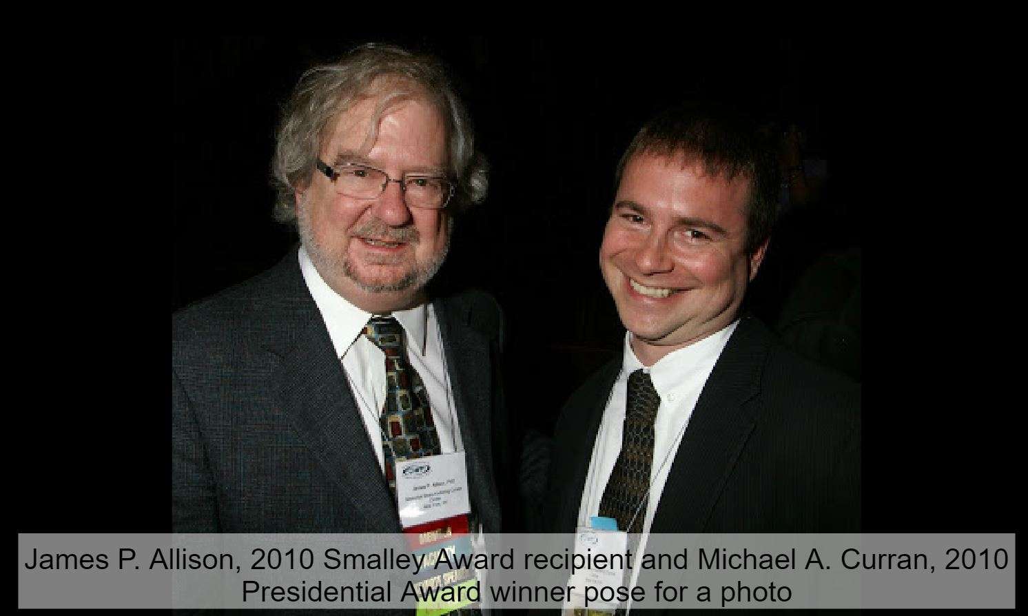 Two male scientists who are award-winning cancer immunotherapy experts.