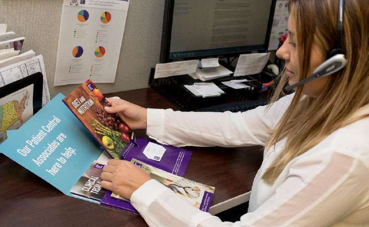 PanCAN Patient Central Associate speaks with caller while compiling a free information packet.