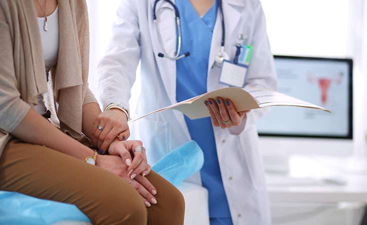 A doctor discusses treatment options with a pancreatic cancer patient.