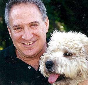 Peter Kenner photographed with his dog before his pancreatic neuroendocrine cancer diagnosis