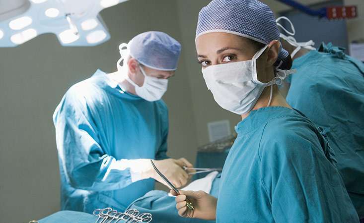 Surgeons prepare to operate on a pancreatic cancer patient who received prior chemotherapy
