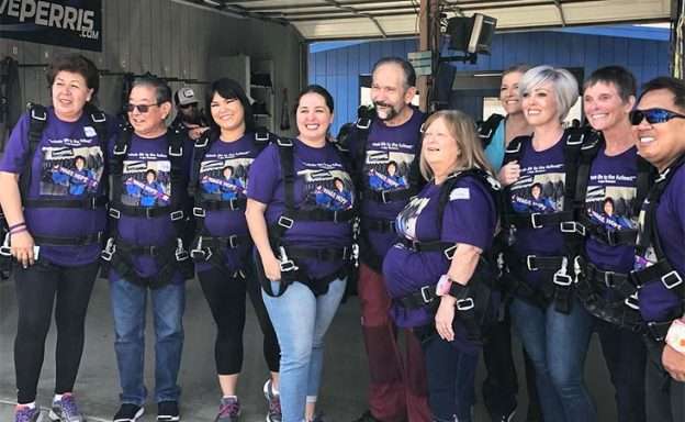 Pancreatic cancer survivors, family members and friends gather for annual skydive.