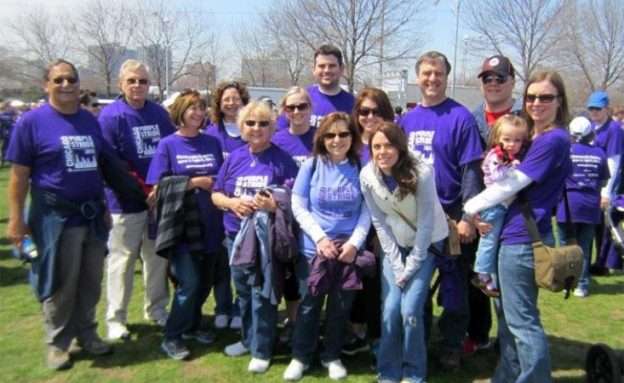 Family of 12-year pancreatic cancer survivor gather around her at 5K walk in Chicago