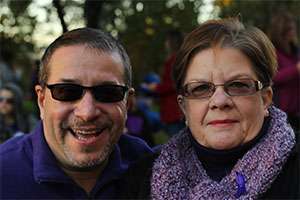 Pancreatic cancer survivor and PanCAN volunteer smiles with his wife