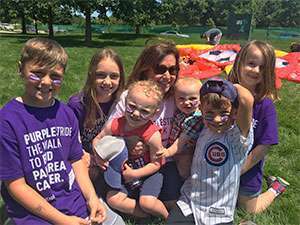 12-year survivor with grandkids at PurpleStride Chicago 2018, the walk to end pancreatic cancer