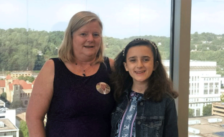 A pancreatic cancer community advocate volunteer serves West Virginia with her daughter