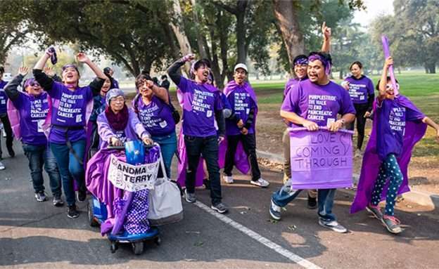 Participants pose for funny photo at the 5K walk to end pancreatic cancer