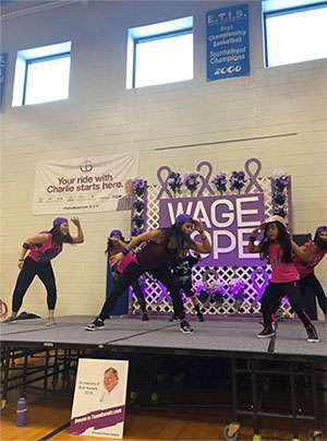 Dancers at a Zumba-themed fundraiser to support PurpleStride, the walk to end pancreatic cancer