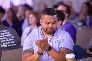 PanCAN Colorado Affiliate volunteer clapping at 2019 national conference session in Los Angeles