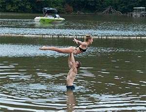 Attendees at the Dirty Dancing Festival try to reenact the famous lake-lift scene from the movie
