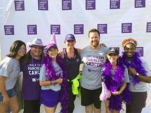 Smiling PurpleStride Nashville supporters gather together at the walk to end pancreatic cancer