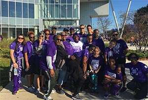 PurpleStride team huddles together in Jacksonville for the walk to end pancreatic cancer