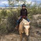 Pancreatic cancer patient on horseback in Arizona one year after her diagnosis