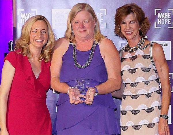 PanCAN volunteer receiving award from PanCAN President and Board of Directors Chair