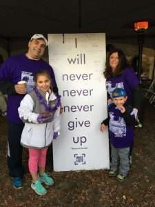Pancreatic cancer survivor with his family at Pancreatic Cancer Action Network’s PurpleStride