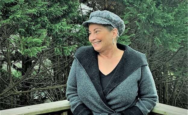 Pancreatic cancer survivor, smiling and staying positive