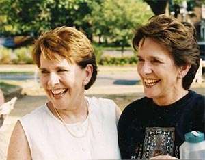 Twin sisters and PanCAN volunteers laughing together before one died from pancreatic cancer