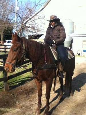 Volunteer and longtime pancreatic cancer survivor and her horse