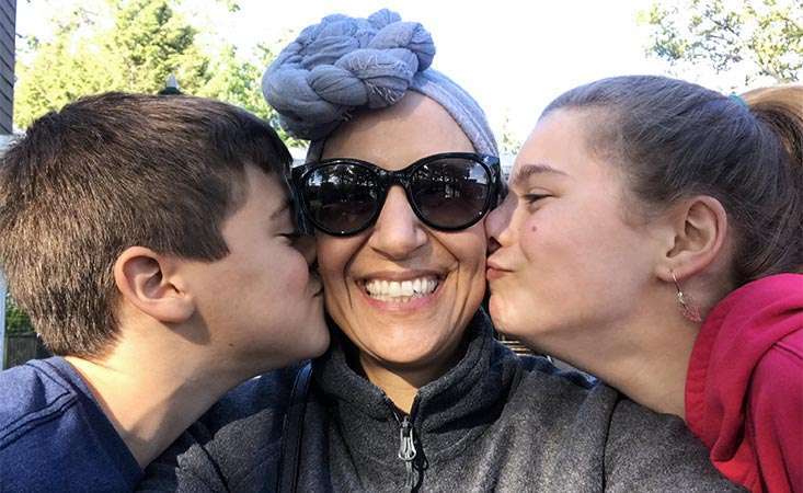 New York City pediatrician and stage IV pancreatic cancer survivor with her children