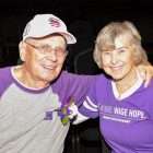 Stage IV pancreatic cancer survivor and his wife wearing purple PanCAN t-shirts