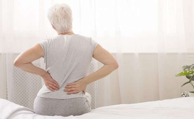 Woman with pancreatic cancer has back pain caused by her tumor