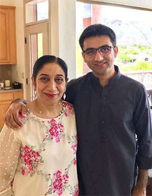 Pancreatic cancer surgeon-scientist with his mother, who inspired him to pursue medicine