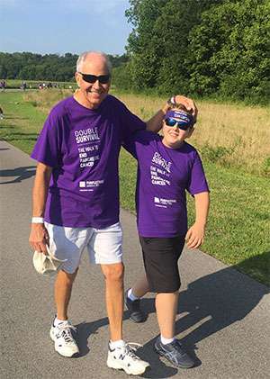 Stage cancer survivor and his grandson at pancreatic cancer walk