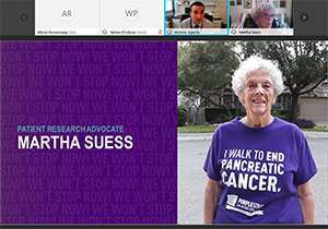 Pancreatic cancer patient research advocate discusses science with a researcher