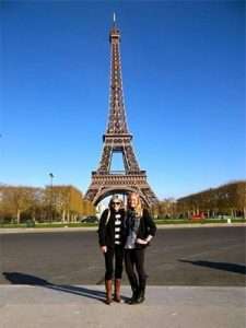 Mom and daughter in front of Eiffel Tower