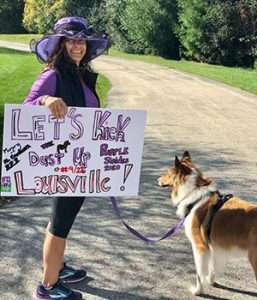 Woman and her dog participate in 22 PurpleStride events across the country.