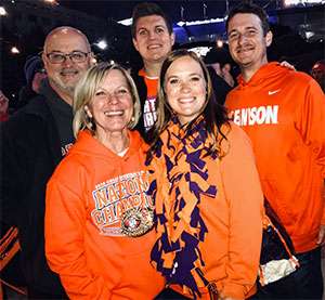 Stage 4 pancreatic cancer survivor and her family support Clemson University football team