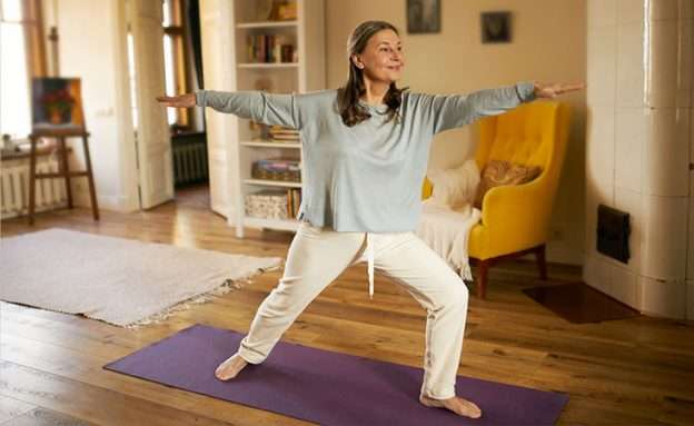 middle-aged woman doing yoga
