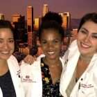 Karla and two other women in nursing attire smiling