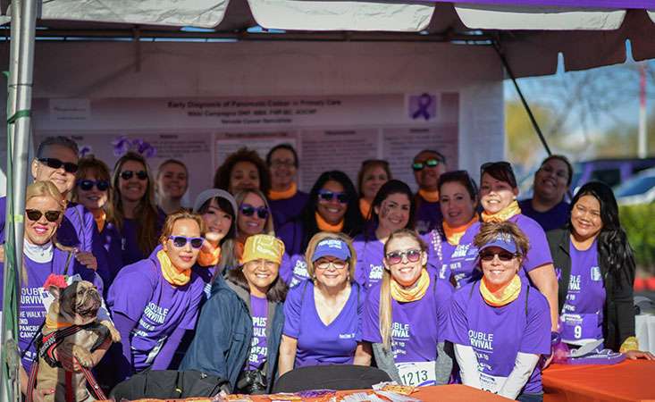 Team of fundraisers at an outdoor walking fundraiser.