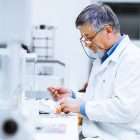 Pancreatic cancer researcher examining blood sample