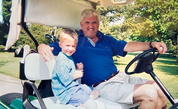 A young Matt Ernst is shown with his grandfather, Pete Carpenter