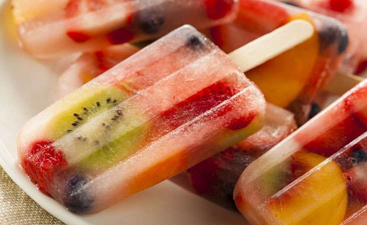 Delicious fruit salad popsicles that make for a healthy, cool summer treat