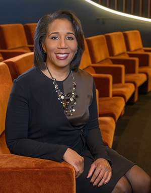 Headshot of professional, middle-aged Black female